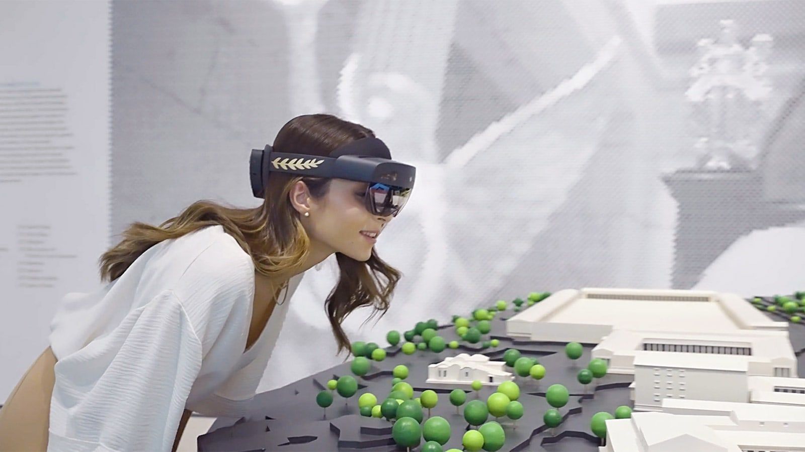 Woman wearing Hololens headset.